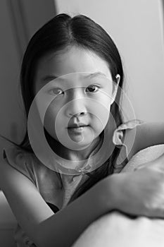 Portrait of little girl in black and white