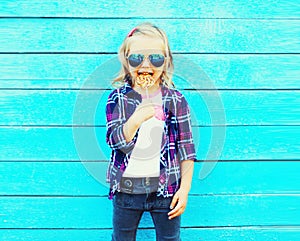 Portrait little girl child with lollipop stick