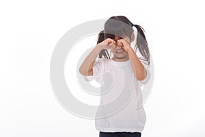 Portrait of little girl crying.on white background