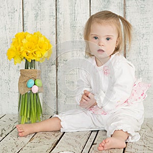 Portrait of a little girl with Down syndrome