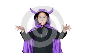 Portrait little girl dressed Halloween costume with face make up. Kid in Dracula robe with frightening expression isolated on