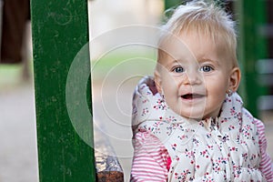 Portrait of little girl having a good happy time in the park