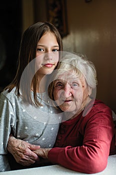 Portrait of little girl and her grandmother. Love.