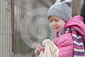 Portrait of a little girl in a hood