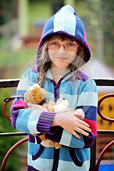 Portrait of little girl in a hoody photo