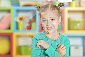 Portrait of a little girl making funny faces