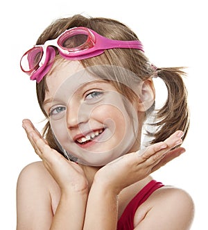 Portrait of little girl with pink swim glasses