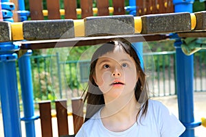 Portrait of little girl in the playground