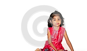 Portrait of a little girl playing on the floor