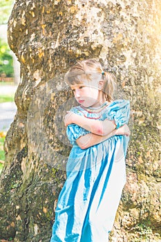 Portrait of a little girl with pouty face