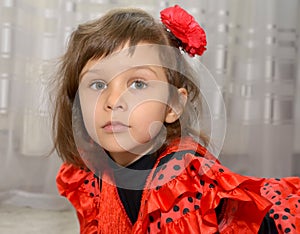 Portrait of the little girl in the Spanish suit