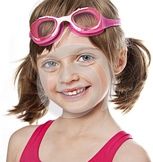 Portrait of little girl with swim glasses