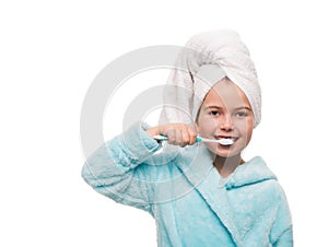 portrait of little girl wearing bathrobe with towel on head brus