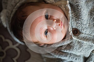 Portrait of a little mixed race blue eyes baby