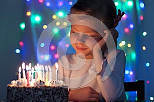 little pretty girl with a birthday cake