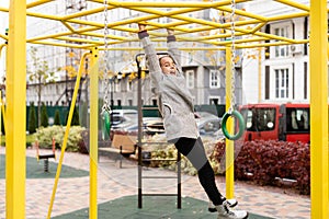 portrait of a little schoolgirl girl at the playground