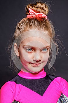 Portrait of little sporty girl gymnast