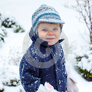 Portrait of little toddler boy on autumn day