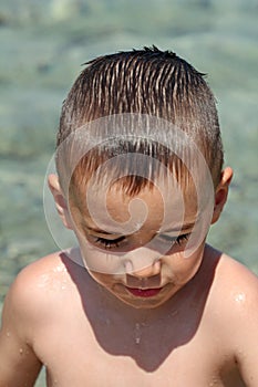 Portrait of a little wet boy