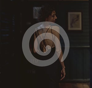 Portrait of a lone woman at a bar