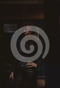 Portrait of a lone woman at a bar