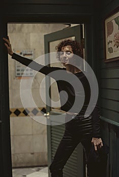 Portrait of a lone woman at a bar