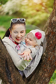 Portrait lovely mother and child together outdoors