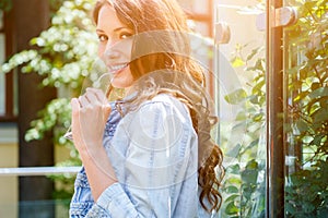 Portrait of lovely smiling woman in profile