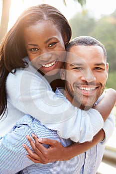 Portrait Of Loving African American Couple In Countryside