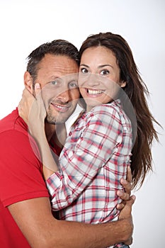 Portrait of loving couple on white background