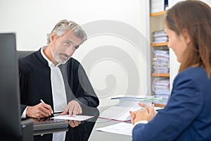 portrait magistrate talking to client