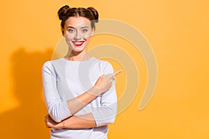 Portrait of magnificent attractive youngster telling way wearing white jumper isolated on vibrant background