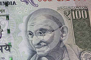 portrait of Mahatma Gandhi on one hundreed rupees banknote