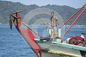 Portrait of a Malaysian male worker on the fishing boat in Kota Kinabalu, Sabah, Malaysia