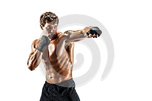 Portrait of male boxer who training and practicing jab on white background. sport, healthy lifestyle