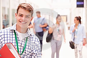 Portrait Of Male College Student In Hallway photo