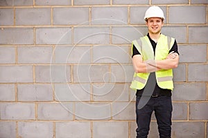 Portrait Of Male Construction Worker On Building Site