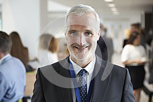 Portrait Of Male Delegate During Break At Conference