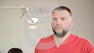 Portrait of a male doctor in a dental office. Dentistry