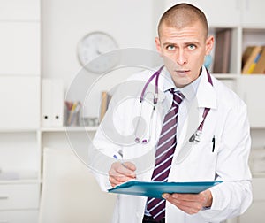 Portrait of a male doctor in the resident's office