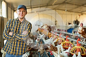 Portrait of a male farmer in poultry farm