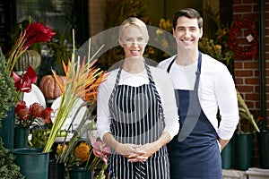 Portrait Of Male And Female Florist Outside Shop