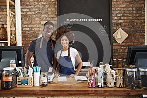 Portrait Of Male And Female Owners Of Sustainable Plastic Free Grocery Store