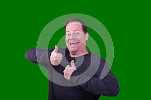 Portrait of male guy gesturing two thumbs up excited expression