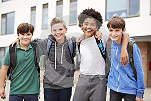 Portrait Of Male High School Student Friends Standing Outside School Buildings