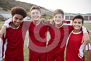 Portrait Of Male High School Students Playing In Soccer Team