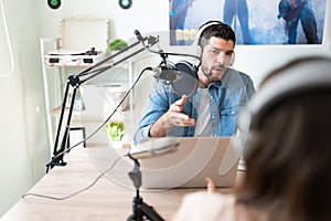 Talking during a podcast interview photo