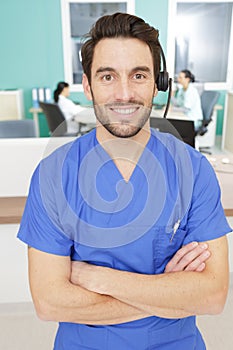 portrait male medical secretary wearing headset