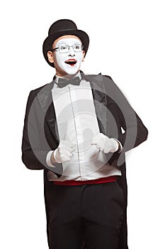 Portrait of a male mime artist performing, isolated on white background. Symbol of joy, anticipation, joyful expectation