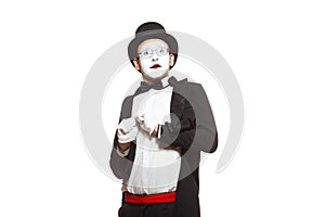 Portrait of a male mime artist performing,  on white background. Symbol of fright, fear, scared, horror movie